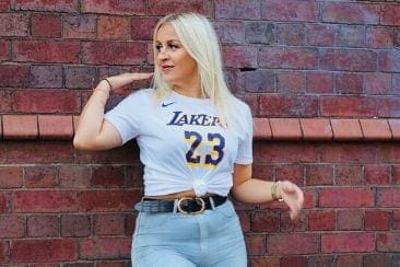 Woman by brick wall Sheddy Maria