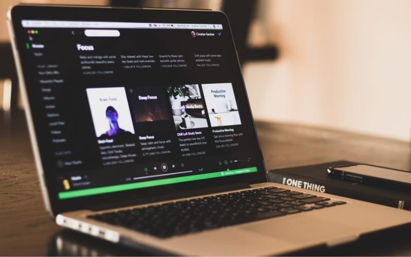 Spotify playing on a laptop Мusic Gateway