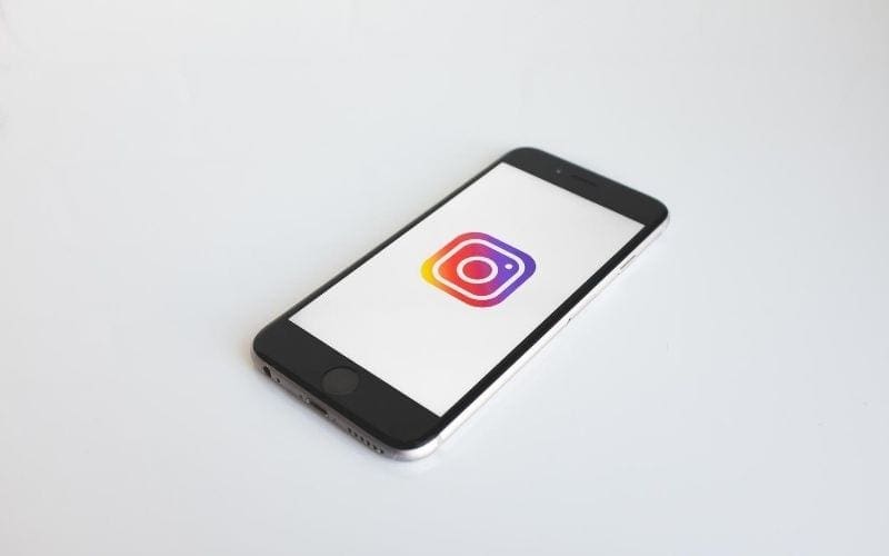Instagram logo on mobile phone screen