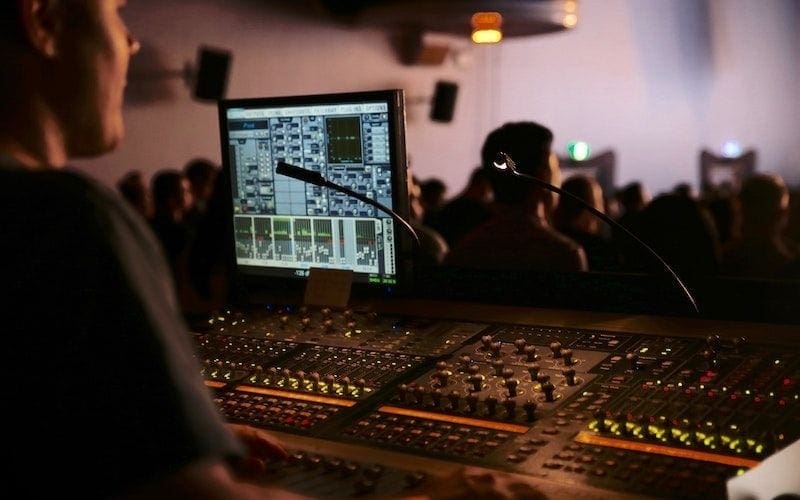 sound engineer mixing desk live