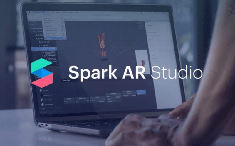Spark AR Studio logo with man creating filter in background.