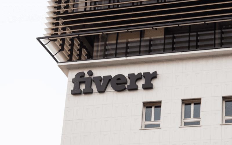 A building with the fiverr logo in the corner. fiverr.com.
