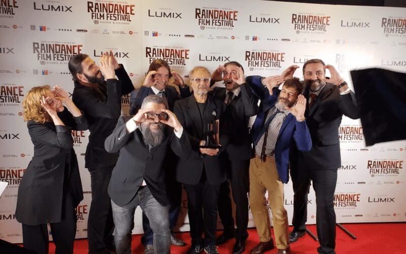People posing for a picture at Raindance film fest.