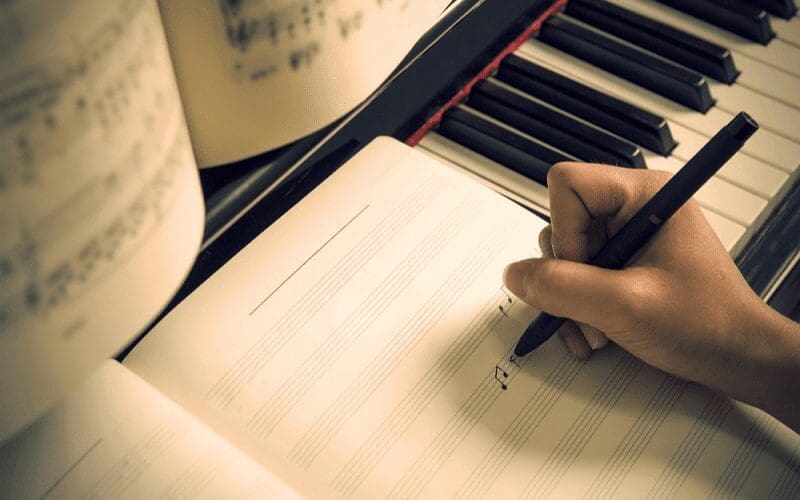 music composer writing music