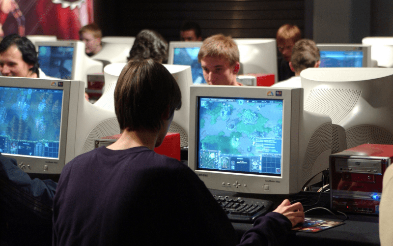 esports gamer playing on computer 2000s