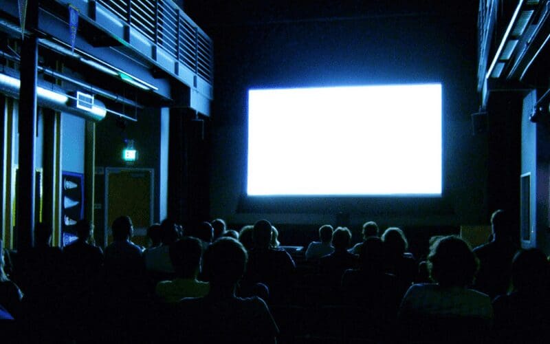 cinema with big screen and audience 