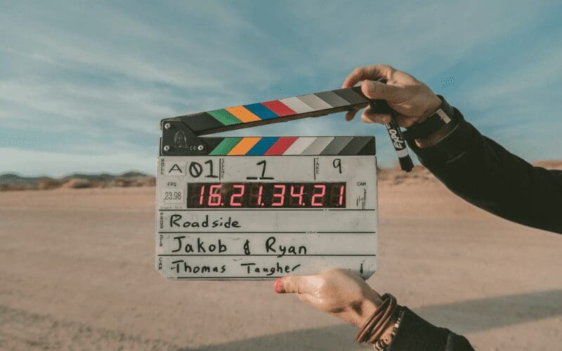A clapperboard being held in a desert, ways to end a story