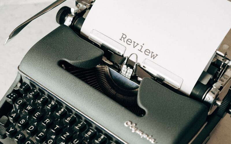 typewriter with film critic review