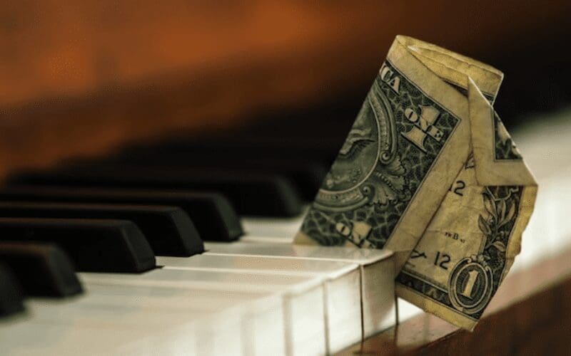 piano with money
