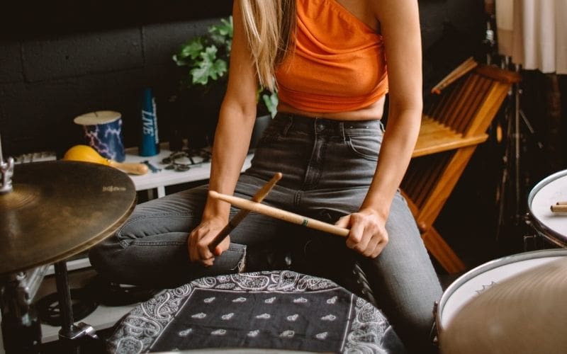 woman playing the drums