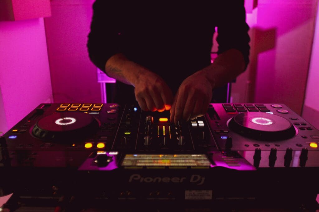 Techno DJ Playing Pioneer CDJs